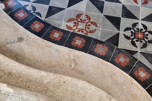 a close up of a tiled floor in a building at La Chapelle sur la Sorgue in LʼIsle-sur-la-Sorgue
