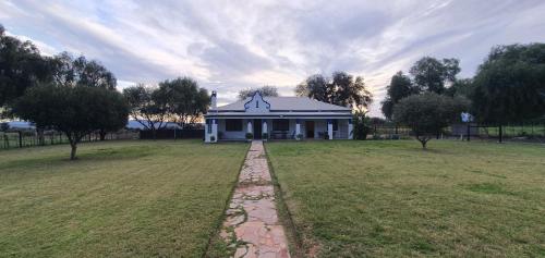 Κήπος έξω από το Karoo Leeu Self Catering