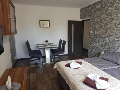 Postel nebo postele na pokoji v ubytování Apartmán Lenka