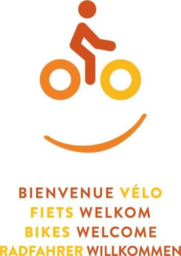 a sign with a person riding a bike at Ô Macra House - Aubel, Pays de Herve in Aubel