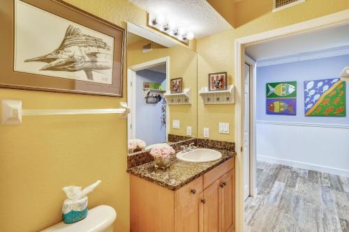 a bathroom with a sink and a toilet at Oceanside 302 in Clearwater Beach