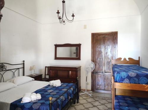 Postel nebo postele na pokoji v ubytování BAGLIO MULINO