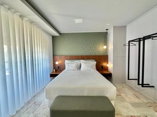 En eller flere senge i et værelse på YOUROPO - Downtown