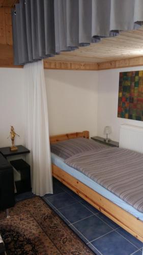a bedroom with two bunk beds in a room at Gästeapartment Brachelen in Hückelhoven