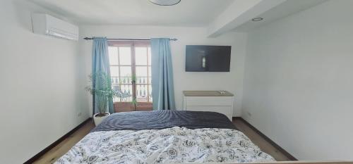 Katil atau katil-katil dalam bilik di Finca Es Verger Coll de Tords