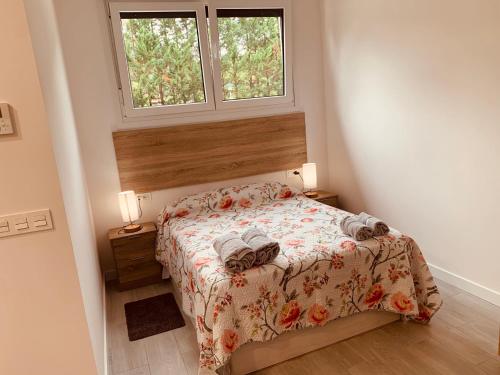 LAGA&LAIDA APARTAMENTOS GERNIHOST en Urdaibaiにあるベッド