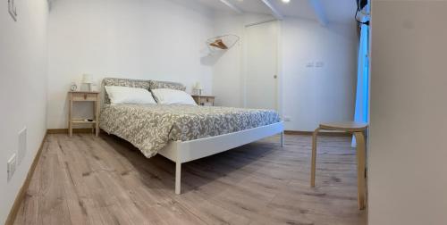 Posteľ alebo postele v izbe v ubytovaní Da Cleo-nel cuore del Barocco Siciliano