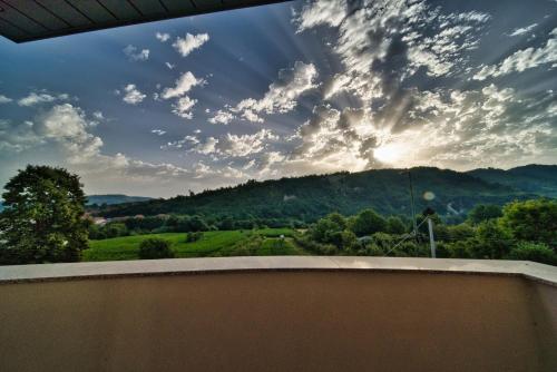 a view from the roof of a house with a view of a mountain at SM Exclusive Apartments in Visoko