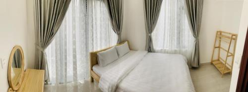 Posteľ alebo postele v izbe v ubytovaní Trung Nghĩa Villa 20