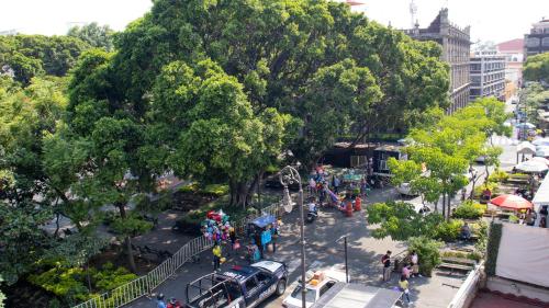 an aerial view of a park with a playground at Suites Las Plazas in Cuernavaca