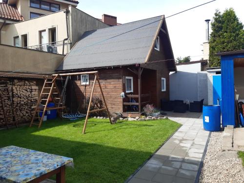 Domek drewniany i Pokoje Gościnne u Buczka