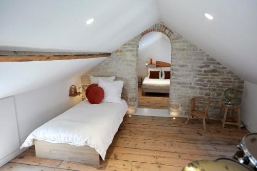 Postel nebo postele na pokoji v ubytování Couette&Living