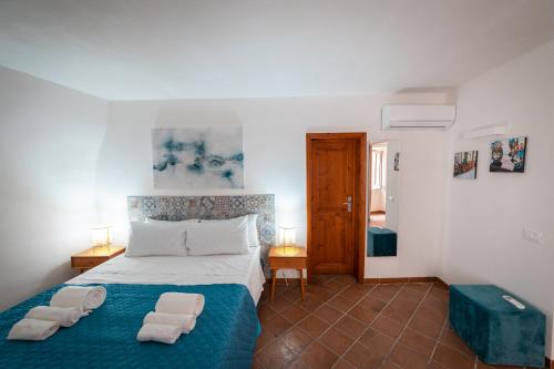 Sicily Home-affittacamere mediterraneoにあるベッド