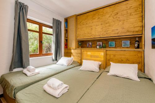 Postel nebo postele na pokoji v ubytování Luxurious Refuge in National Park on Island - heated Pool - 5 minutes to Ocean