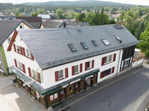 an overhead view of a building with a roof at Landhotel Jägerhof in Bischofsgrün