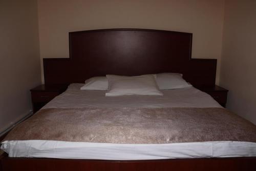 Postel nebo postele na pokoji v ubytování RL Hotel