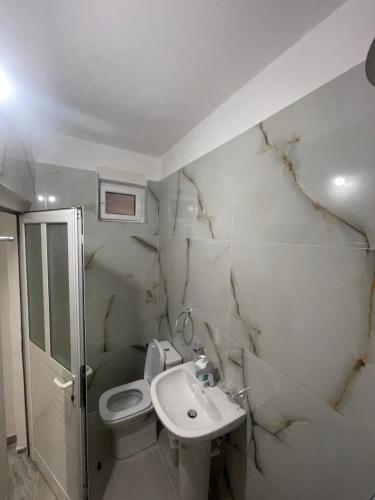 Kúpeľňa v ubytovaní Hotel Gjika