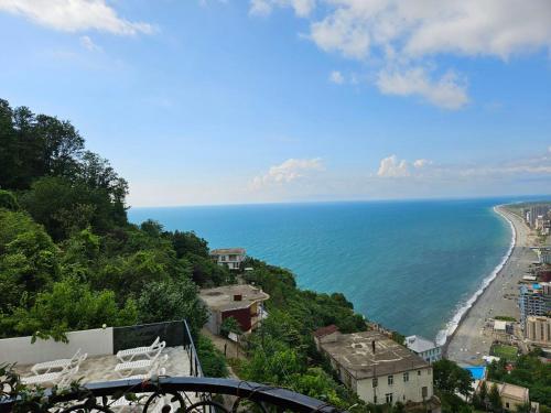 a view of a beach and the ocean at Goga Guest House in Kvariati