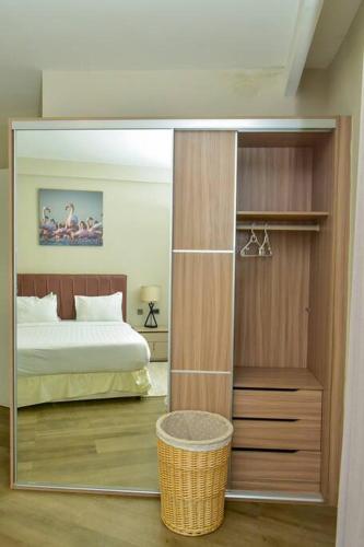 Llit o llits en una habitació de Zuri Residence