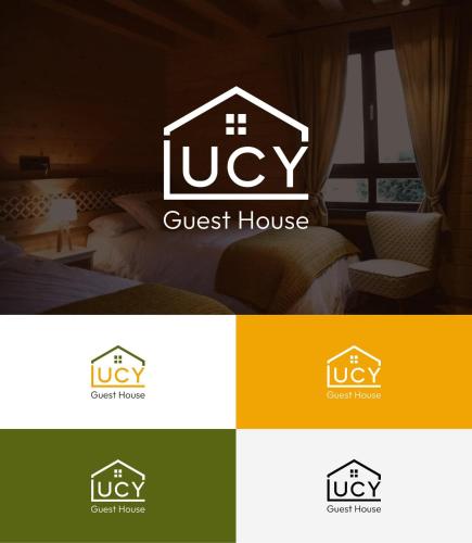 a guest house logo with a guest house at Lucy in Garni