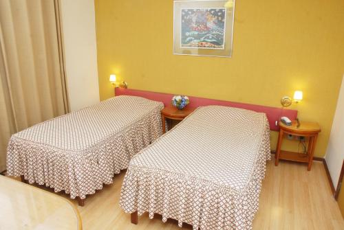 Katil atau katil-katil dalam bilik di Hotel Bucsky