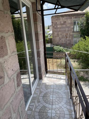 Un balcón o terraza en Armani Guest house