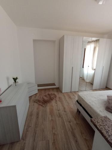 Ένα ή περισσότερα κρεβάτια σε δωμάτιο στο A casa di Gigi