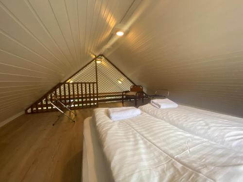 Postel nebo postele na pokoji v ubytování Vallakot Farm Guesthouse