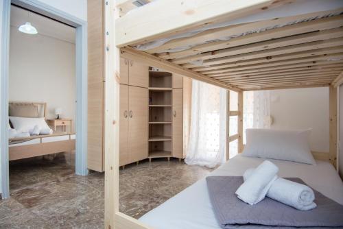 En eller flere senge i et værelse på Argostoli Heart:A Perfect Escape