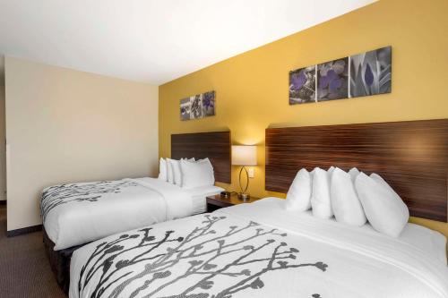 Ένα ή περισσότερα κρεβάτια σε δωμάτιο στο Sleep Inn North - Central York