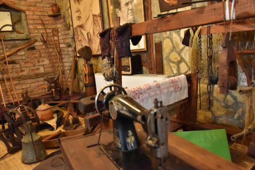 a room with a sewing machine on a table at Saint George in Strumica