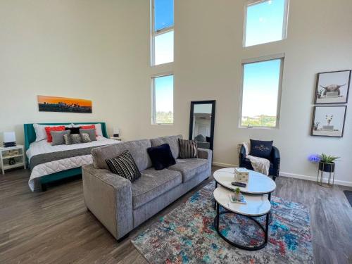 A seating area at Downtown Los Angeles Skyline balcony view Modern Penthouse