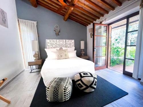 Ένα ή περισσότερα κρεβάτια σε δωμάτιο στο Dojo Bianco