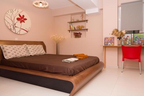 Postel nebo postele na pokoji v ubytování Διαμέρισμα Αριάδνη