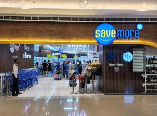 a save more store in a shopping mall at Apartment Condo in Air Residences Makati wifi Netflix Disney, pool & mall in Manila