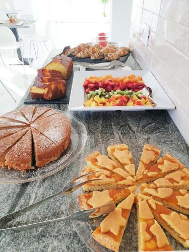 a table topped with lots of different types of food at Perla Blu Tropea in Tropea