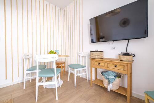 TV a/nebo společenská místnost v ubytování Mira casa