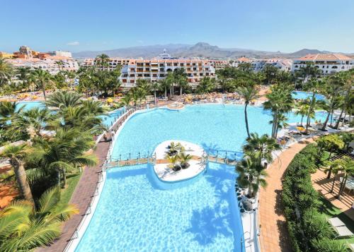 an aerial view of a pool at a resort at Parque Santiago III Official in Playa de las Americas