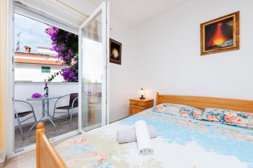 En eller flere senge i et værelse på Luna Tsuki Seven