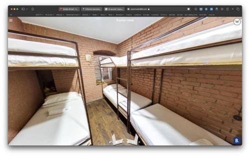 Postel nebo postele na pokoji v ubytování Hostel Pirosmani