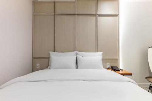 Eumseong Hotel Luemにあるベッド