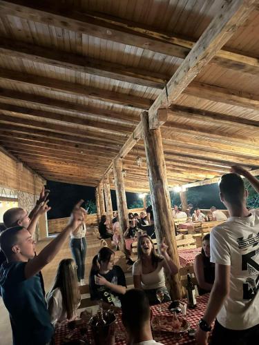 a group of people sitting in a room at Vucja Gora in Foča