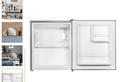 a white refrigerator with its door open in a kitchen at Double Bedroom in converted garage-No shower,bath facility in Bristol