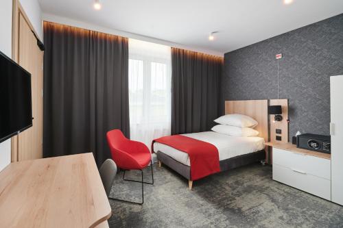 Ένα ή περισσότερα κρεβάτια σε δωμάτιο στο Best Western Plus Hotel Rzeszow City Center