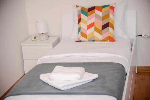 Ένα ή περισσότερα κρεβάτια σε δωμάτιο στο Mini Hotel RiverLux Apartments
