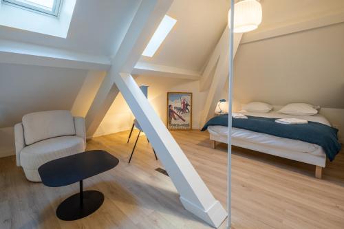 Tempat tidur dalam kamar di La Savoy 1 - Thermes de Saint-Gervais - Happy Rentals