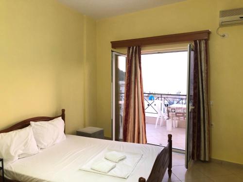 Postel nebo postele na pokoji v ubytování Center Hotel Piro