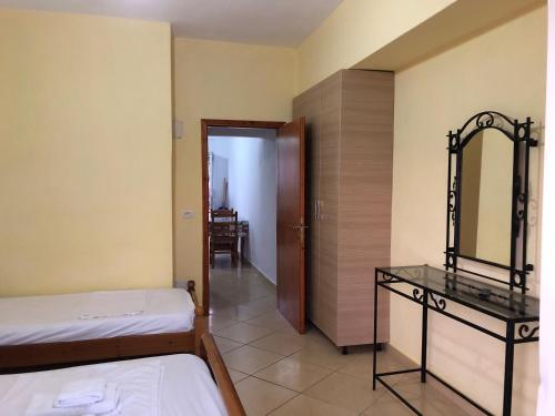 Postel nebo postele na pokoji v ubytování Center Hotel Piro