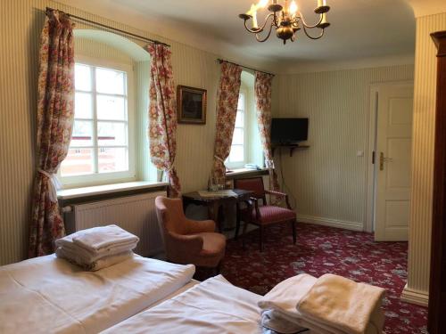 Postel nebo postele na pokoji v ubytování Hotel Palac Staniszow
