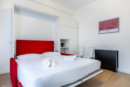 Postel nebo postele na pokoji v ubytování Prada & Bocconi - Cozy Studio, Fast WiFi, Tram